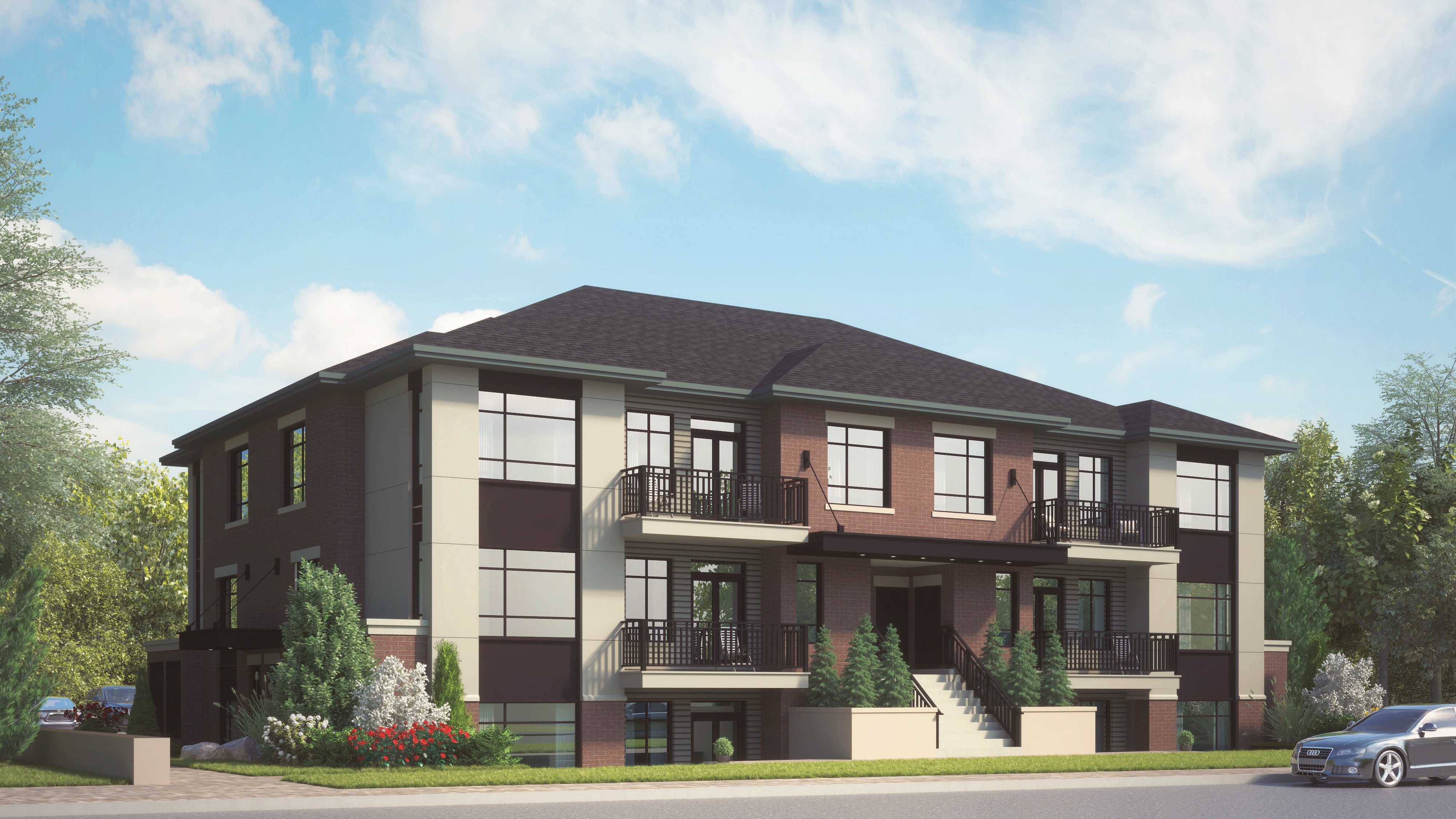 A modern two-story house with a balcony on the second floor.